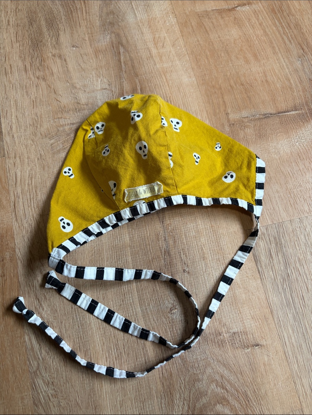 Stella & Wilbur Yellow Skull-Print Kids Bonnet with Black White Striped Ties
